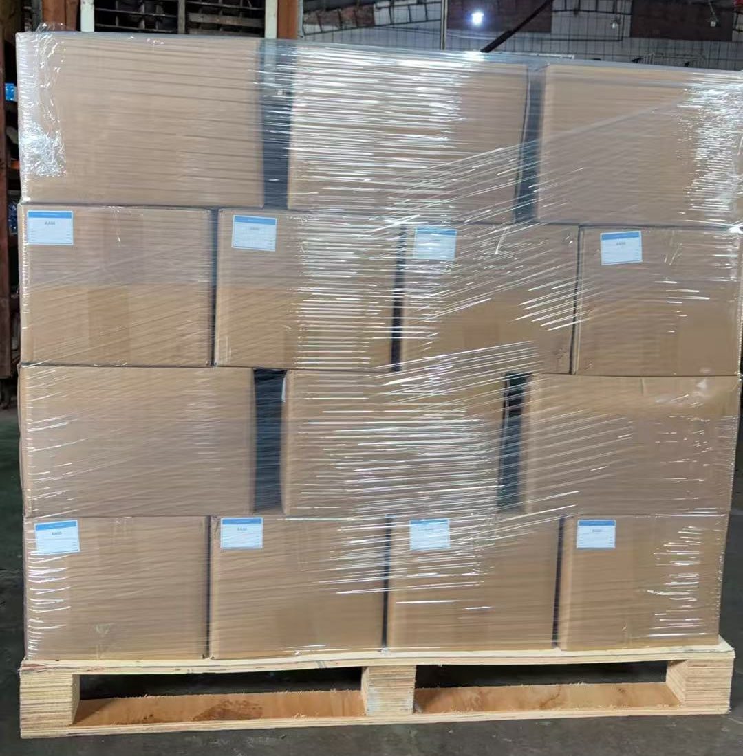 Cartons of jelly glue stacked on a pallet and wrapped